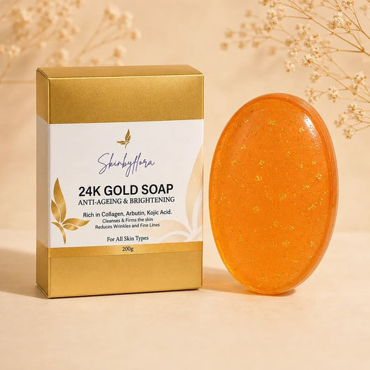 Skin by Flora 24K Gold and Collagen Cleansing Bar with upright gold box and orange soap bar