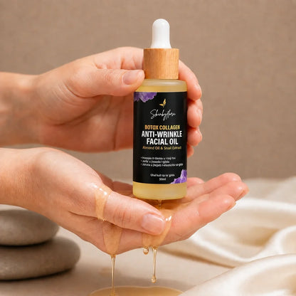 Skin by Flora Botox Collagen Anti-Wrinkle Facial Oil held in hands